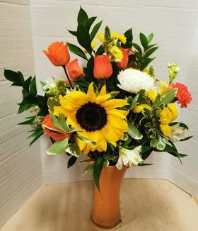 Beautiful floral arrangement using locally grown flowers at Maple Park Farm in Tofield, Alberta.  All flowers are grown chemical and pesticide free.  Sunflowers are a florist favorite.