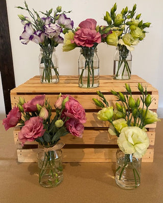Lisianthus mini jar arrangements.  Perfect for smaller areas that need a little boost.  Lisianthus are long lived cut flowers.